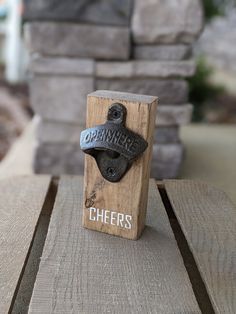 a bottle opener sitting on top of a wooden table