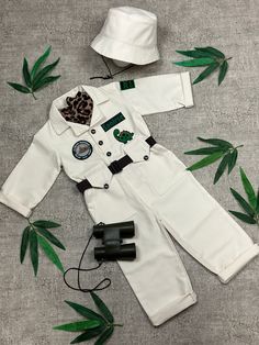 ⭐️Welcome to Mama's Dream Shop⭐️ 🦖 Step into the wild world of adventure with our Dinosaur Costume for Kids and Babies One Piece Jumpsuit! This meticulously crafted outfit is designed to ignite your child's imagination and bring their safari dreams to life.   🦕Made with the utmost care and attention to detail, this one piece jumpsuit captures the essence of a true dinosaur explorer. The jumpsuit features a safari-inspired design with khaki tones, complete with adorable animal patches that add Costume Dinosaure, Kids Dinosaur Costume, Explorer Costume, Toddler Halloween Costume, Animal Patches, One Piece Jumpsuit, Dinosaur Costume, Toddler Halloween Costumes, Toddler Halloween