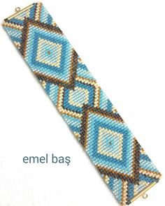 a beaded bracelet with blue, brown and white squares on it's side