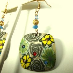 "Flower Dangle Earrings with Goldtone Filigree Bead & EarWire Tops, Fimo Plastic clay Squares with Embedded Rhinestones, Green, Yellow Gray Rachelle Starr OOAK Recycled These are 3\" long,and 1 3/4 \" wide ( 7.62cm x 4.445cm) recycled pieces with added beads on earwires ----------MORE EARRINGS: https://www.etsy.com/shop/VintageStarrBeads/search?search_query=earrings&order=date_desc&view_type=list&ref=shop_search ------------------ PLEASE NOTE I only ship to your paid ETSY invoice Jeweled Beaded Dangle Earrings For Gifts, Jeweled Earrings As Gift, Flower Dangle Earrings, Beaded Dangle Earrings, Star Flower, Tube Beads, Small Jewelry, Beaded Dangles, Green Yellow