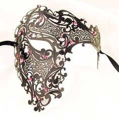 Made for men, can be worn on women as well. This deluxe, venetian-style decor mask features crystals, rhinestones and designs, will surely make you stand out stylishly. All of the masks are hand made and intricately designed offering each a unique flair. This Venetian mask comes in several colors. Luxury Elegant Formal Masks, Luxury Elegant Masquerade Mask For Theater, Rhinestone Eye Masquerade Mask For Costume Party, Rhinestone Masquerade Mask For Mardi Gras Carnival, Mardi Gras Masquerade Mask With Rhinestones For Carnival, Masquerade Mask With Rhinestones For Carnival, Rhinestone Mask For Carnival Masquerade, Rhinestone Mask For Masquerade Carnival, Rhinestone Eye Mask For Masquerade Costume Party