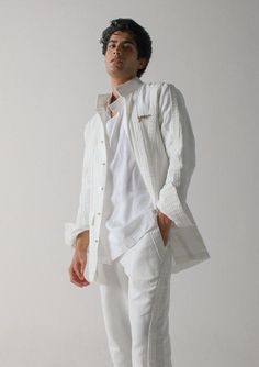 Editor's Note Elevate your wardrobe with our white linen overshirt, featuring vertical stripe pintuck detailing for a touch of sophistication. This versatile piece can be worn as a lightweight outer layer or buttoned up as a standalone shirt. The vertical stripe pintuck adds visual interest and texture to the shirt, while the breathable linen fabric ensures comfort and style. Whether paired with jeans for a casual look or dressed up with tailored trousers, this white linen overshirt is a timeles Blouse Yoke, Personal Shopping Service, Bespoke Clothing, Indian Party, Indian Party Wear, Tailored Trousers, Pin Tucks, Personal Shopping, White Linen