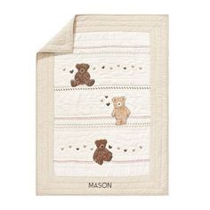 a baby blanket with two teddy bears on the front and one bear on the back