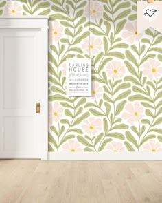 an open door in front of a floral wallpapered room with pink and green flowers