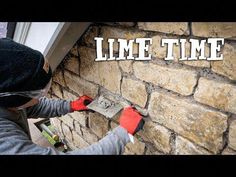 a man is working on a brick wall with the words lime time in front of him