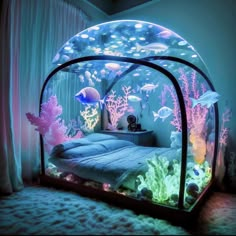 an aquarium bed is lit up with colorful lights and fish in the water, as well as corals