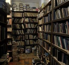 a long row of bookshelves filled with lots of books