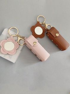 1PC Mini Lipstick Holder Keychain With Compact Mirror Lipstick Sleeve Pouch PU Leather Lip Balm Portable Pocket Lip Gloss Holder Women Girls Gift, Cute Lipstick Holder Keychain With Flowers Shaped Mirror, Women's Makeup Bag, Keychain Pendant, Purse, Wallet, Bag Accessories, For Vacation, Holidays, Travel For Trip For Lip Gloss Lipstick Lip Oil Lip Balm Multicolor    Zinc Alloy Geometric,Plain    Bag Accessories, size features are:Bust: ,Length: ,Sleeve Length: Lip Gloss Holder, Cute Lipstick, Mirror Keychain, Mini Lipstick, Bag Keychain, Shaped Mirror, Lip Balm Holder, Lipstick Holder, Gloss Lipstick