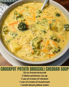 a bowl of broccoli cheddar soup on a table