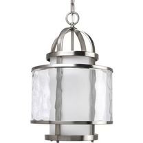 a light hanging from a ceiling fixture with a white glass shade on it's side