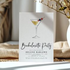 a card that says bachelor party next to a vase with flowers