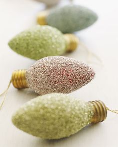 christmas ornaments are lined up on a table