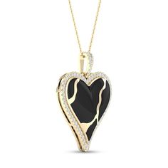 What's broken becomes stronger, as represented by this heart-shaped Kintsugi-inspired pendant. 10K gold Pendant features a heart-shaped black ceramic Kintsugi-inspired inset. This design takes inspiration from the ancient Japanese craft of Kintsugi that mends broken pieces of pottery back together using gold. The pendant is outlined with 1/4 ct. t.w. of sparkling diamonds. 18.0-inch cable chain; lobster claw clasp. Black Locket Jewelry For Anniversary, Black Heart-shaped Necklace For Keepsake, Black Pendant Jewelry For Keepsake, Black Heart Necklace For Keepsake, Black Locket For Anniversary, Black Heart Necklaces For Keepsake, Luxury Black Heart Pendant Necklace, Luxury Black Heart Pendant Jewelry, Black Locket Necklace For Anniversary