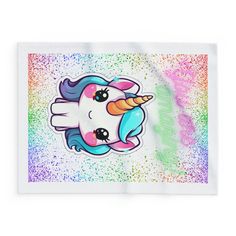 a unicorn sticker with glitter on it's face and rainbow manes around its head