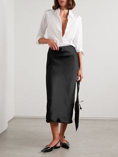 A slip skirt forms the foundation of so many outfits - you can wear Norma Kamali's 'Obie' style with anything from a chunky sweater to a simple tank or elevated bodysuit. It's made from lustrous black satin that's cut on the bias for a pretty drape and has an elasticated waist and crepe de chine lining. Winter Work Wear, Crochet Maxi Skirt, Satin Maxi Skirt, Crochet Maxi, Satin Midi Skirt, Slip Skirt, Satin Maxi, Norma Kamali, Chunky Sweater