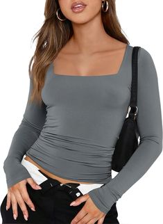 The Trendy Queen Women's Long Sleeve Crop Top is a must-have for 2023, combining fashion and function with its slim-fitting design and square neckline. Perfect for fall outfits, this versatile top offers a flattering, body-hugging fit that’s ideal for workouts or casual wear. The long sleeves make it a great choice for cooler weather, while the Y2K-inspired style adds a trendy, throwback vibe to your wardrobe. Pair it with high-waisted leggings, jeans, or skirts for a chic and effortless look that keeps you stylish and comfortable all day long.

#LongSleeveCropTop #TrendyQueenFashion #Y2KStyle #SlimFittedTop #FallFashion #SquareNeckTop #2023Trends #WorkoutClothes #ChicAndComfy #casualoutfitsideas Y2k Workout, Crop Tops Fashion, Basic Crop Tops, Yoga Daily, Vacation Shopping, Rave Party, Queen Fashion, Tops Fashion, Y2k Outfits