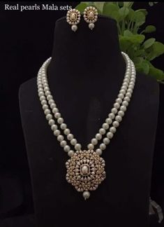 Gorgeous Long CZ Stones Necklace with Pearl in Victorian style with matching earrings Necklace length: 22 inches approx  Highest quality and craftsmanship Free shipping Since natural semiprecious beads are used in this necklace, Color and shape of the beads may vary slightly Please let me know if you have any questions Cheap Traditional Long Necklace, Luxury Dual-tone Temple Jewelry Necklaces, Luxury Long Temple Necklace For Gift, Luxury Temple Necklace With Polished Beads For Wedding, Luxury Vintage Temple Necklace For Ceremonial Occasions, Luxury Dual-tone Temple Necklace, Luxury Antique Temple Necklace For Ceremonies, Luxury Silver Temple Necklace, Pearl Necklace Designs Unique