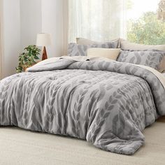 PRICES MAY VARY. Jacquard Design: Featuring a jacquard cable knit design with a faux pilling effect, this comforter set adds a touch of exquisiteness and sophistication to your sleeping space. Soft and Breathable: The brushed microfiber on this comforter set offers an ultra-soft hand-feel, and its smooth texture provides coziness without crinkly noise. Premium Filling: Filled with premium polyester microfiber, this comforter set provides a supremely fluffy hand-feel and breathable warmth. Extra Ugg Queen Comforter Sets, Gray Full Size Comforter, Tufted Bedding, King Size Comforters Bed Bath & Beyond, Beige Duvet Covers, Grey Boho, Queen Size Comforter Sets, Fluffy Comforter, King Size Comforter Sets