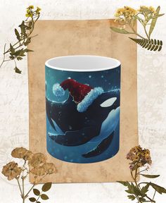 an orca whale wearing a santa claus hat on its back in front of flowers