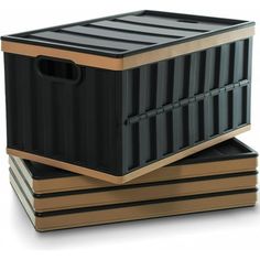 three black containers stacked on top of each other