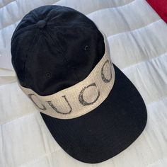 New Authentic Gucci Baseball Cap The Gucci Logo Is On A Wide Headband That Wraps Around The Baseball Cap. (Unisex) Black Gabardine And Off-White Fabric. Made In Italy 100% Authentic. Also Gucci Box Is Included. Pls No Low Ball Offers Because Poshmark Gets 20% Of All Sales. Size Medium Trendy Gucci Hat With Short Brim, Designer Baseball Cap With Adjustable Short Brim, Designer Adjustable Baseball Cap With Short Brim, Designer Baseball Cap With Short Brim, Gucci Hat With Adjustable Size And Short Brim, Designer Beige Adjustable Hat, Designer Gucci Hats With Short Brim, Casual Gucci Cap, Classic Gucci Hat With Flat Brim