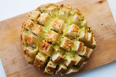 a pastry sitting on top of a wooden cutting board