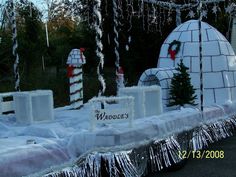 an igloose is decorated with icing and snow for the holiday season