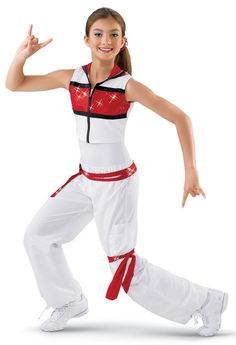 a woman in white and red is dancing