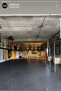 the inside of an empty warehouse with lots of shelves