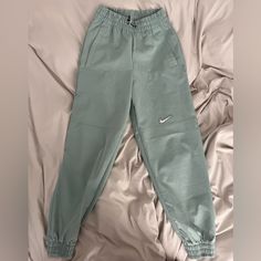 Nike Limited Time Pistachio Green Xs Joggers - Never Worn, 100% Polyester, Adjustable Toggle, 2 Large Mesh Pockets, Cuffed Ankles, Totally Water Resistant. 1 Small Undetectable Oil Stain Above Nike Swoosh Nike Green Joggers With Pockets, Green Nike Joggers With Pockets, Green Sportswear Pants With Pockets, Nike Green Sportswear Bottoms, Nike Green Athleisure Pants, Nike Green Sportswear Pants, Green Gym Pants With Pockets, Casual Green Activewear With Pockets, Green Nike Cotton Pants