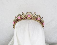 VALENTINE GOLD AND PINK HEART FILIGREE CROWN Brass findings are handstitched to a crown base Painted Gold Embellished with glass gemstones and plastic beads Comfortable and flexible Fits all head sizes from children to adults. ---- One size fits all - bobby pins can easily be used for added securing Beaded Crown, Heart Crown, Pink Crown, Headpiece Jewelry, Soul Mates, Gold And Pink, Princess Aesthetic, Angel Art, Fantasy Jewelry