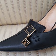 Gorgeous Louis Vuitton Black Leather Pumps With Lv Cube Charms. Very Good Pre-Owned Condition, It Appears That One Of The Heels Has Been Repaired, Deeply Discounted Because Of It. Size Eu 37, Should Be Equivalent To Us 7, However Keep In Mind Lv Shoes Typically Run Narrow And A Half Size Small. Louis Vuitton Pumps, Shoes Louis Vuitton, Lv Shoes, Louis Vuitton Black, Black Leather Pumps, Louis Vuitton Shoes, Leather Pumps, Shoes Women Heels, Shoes Heels