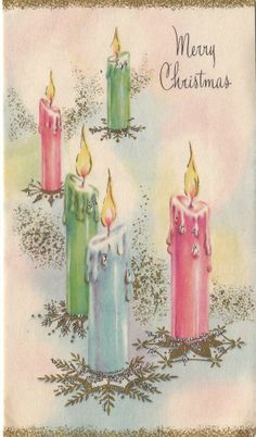 three lit candles with merry christmas written on the top and bottom, surrounded by snowflakes