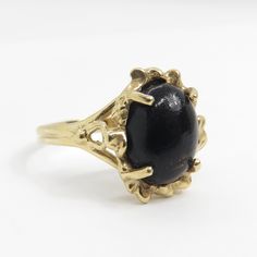 Vintage 14k gold marquise onyx ring with a modernist design oval cut onyx has been set into the 10k gold ring this ring is a size 6 the band at the back of the ring is 1.9mm the face of the ring is 13.5mm x 11.8mm weight of the ring is 2.62 grams onyx stone measures 10.1mm x 7.7mm and is 2 carats this ring is marked Spring 14k Black Oval Opal Ring For Formal Occasions, Black Cabochon Ring In 14k Gold, Black 14k Gold Cabochon Ring, Black Cabochon 14k Gold Rings, Formal Oval Onyx Rings, 14k Gold Black Cabochon Rings, 10k Gold Ring, Baby Rings, Gold Diamond Band