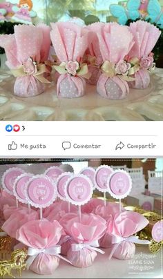 some pink and gold decorations on top of a table with white polka dot paper flowers