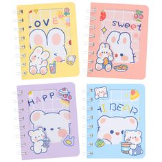 four notebooks with hello kitty stickers on them