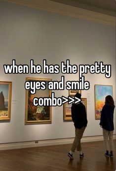 two people looking at paintings in an art museum with the words when he has the pretty eyes and smile combo