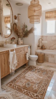 a bathroom with an area rug, sink and toilet in it's centerpiece