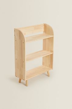 a wooden shelf with two shelves on each side