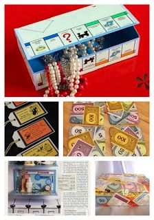 an open box filled with money sitting on top of a red table next to other items