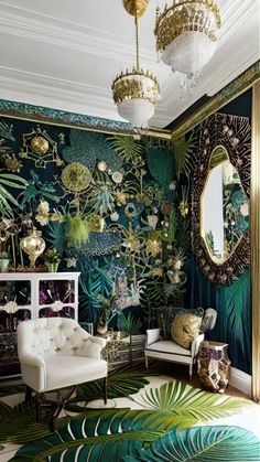 a living room decorated in green and gold with palm leaves on the wall, chandelier