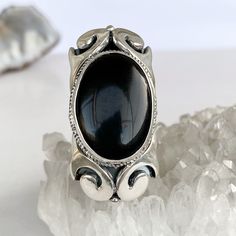 Large onyx ring sterling silver, black gemstone ring goth ring Black crystal ring made in Armenia gifts for women Handmade silver ring with natural black onyx. The ring is large and has a unique look! The free size of this ring lets you give a gift without knowing the size of finger) Also, All our pieces have the perfect design, modern look, and best quality ▶Ring weight: 18.53 gr ▶Length: 45 mm ▶Width: 25 mm All our jewelry is made of high-quality sterling silver and is stamped with a 925 stamp Gothic Sterling Silver Jewelry With Polished Finish, Gothic Sterling Silver Jewelry, Elegant Obsidian Ring Jewelry, Oval Gemstone Gothic Jewelry, Gothic Oval Gemstone Jewelry, Oval Gothic Gemstone Jewelry, Mystical Black Sterling Silver Rings, Black Sterling Silver Crystal Ring, Gothic Sterling Silver Oval Jewelry