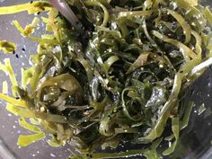 seaweed in a glass bowl with yellow sprinkles