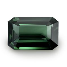 an emerald colored diamond on a white background with clippings to show the green color