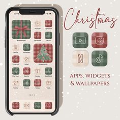 an iphone with christmas icons on the screen