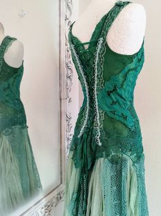 Wedding Mermaid Dress With Long Train And Fitted Bodice, Green Mermaid Dress With Fitted Bodice, Fitted Mermaid Silhouette Wedding Dress, Wedding Dress With Fitted Bodice And Mermaid Hem, Green Lace Evening Dress For Wedding, Sleeveless Green Wedding Gown, Wedding Mermaid Dress With Long Train, Mermaid Wedding Dress With Fitted Bodice, Fitted Mermaid Silhouette Evening Dress For Wedding