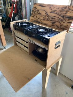 an old stove is being worked on in a garage