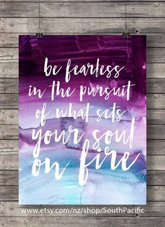 a purple and blue watercolor painting with the words be fearless in the pursuit of what sets your soul on fire