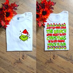 two t - shirts with the grin face on them and some flowers in front of them