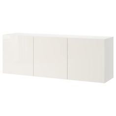 a white cabinet with three doors and two drawers on one side, against a white background